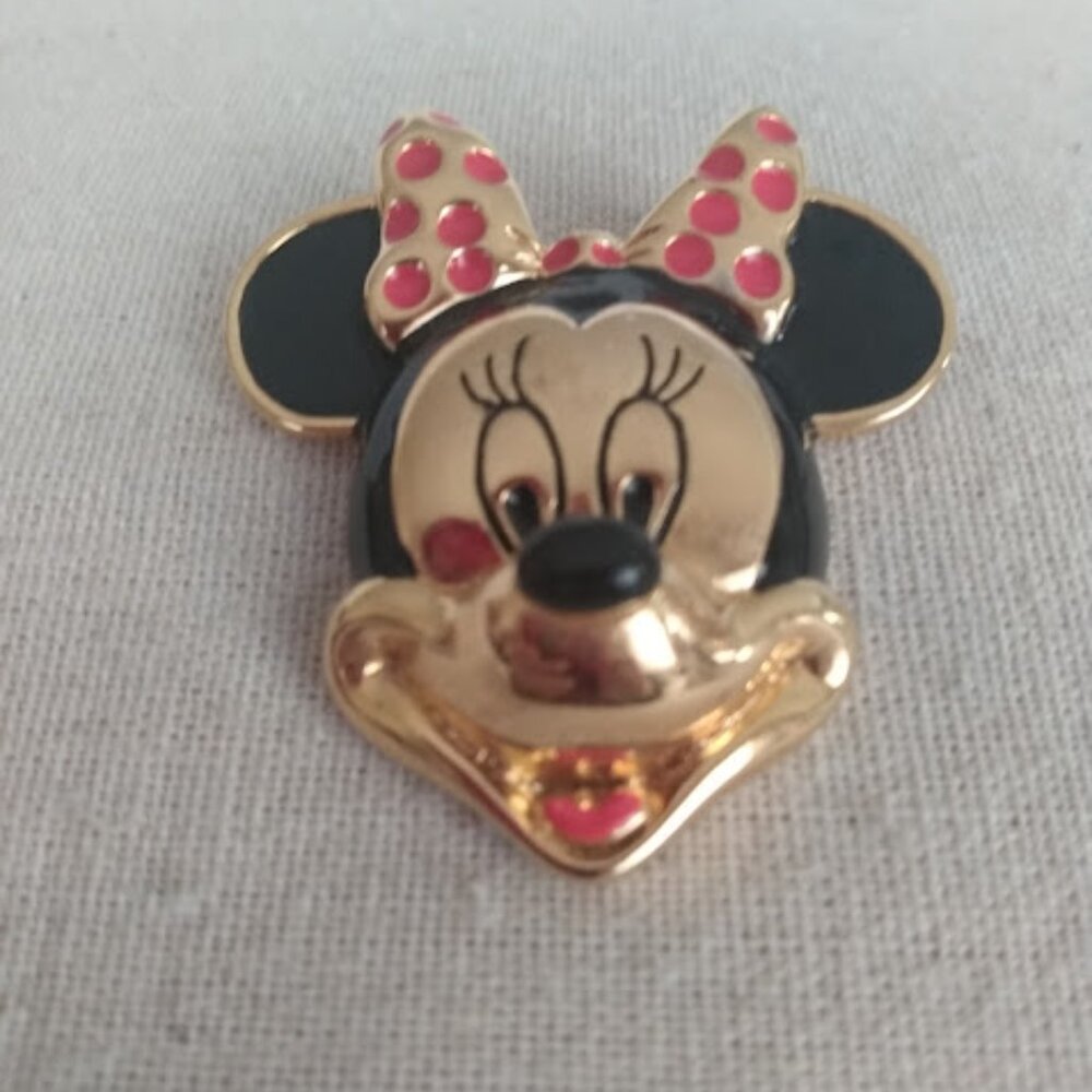 Vintage gold tone Minnie Mouse head brooch. Marked Disney.
